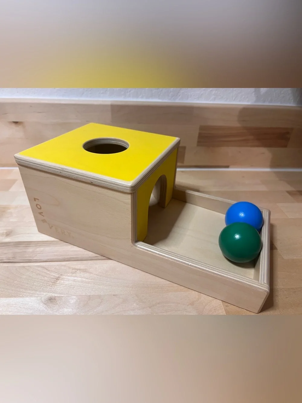 Lovevery Yellow Wooden Ball Drop Toy with Blue & Green Balls